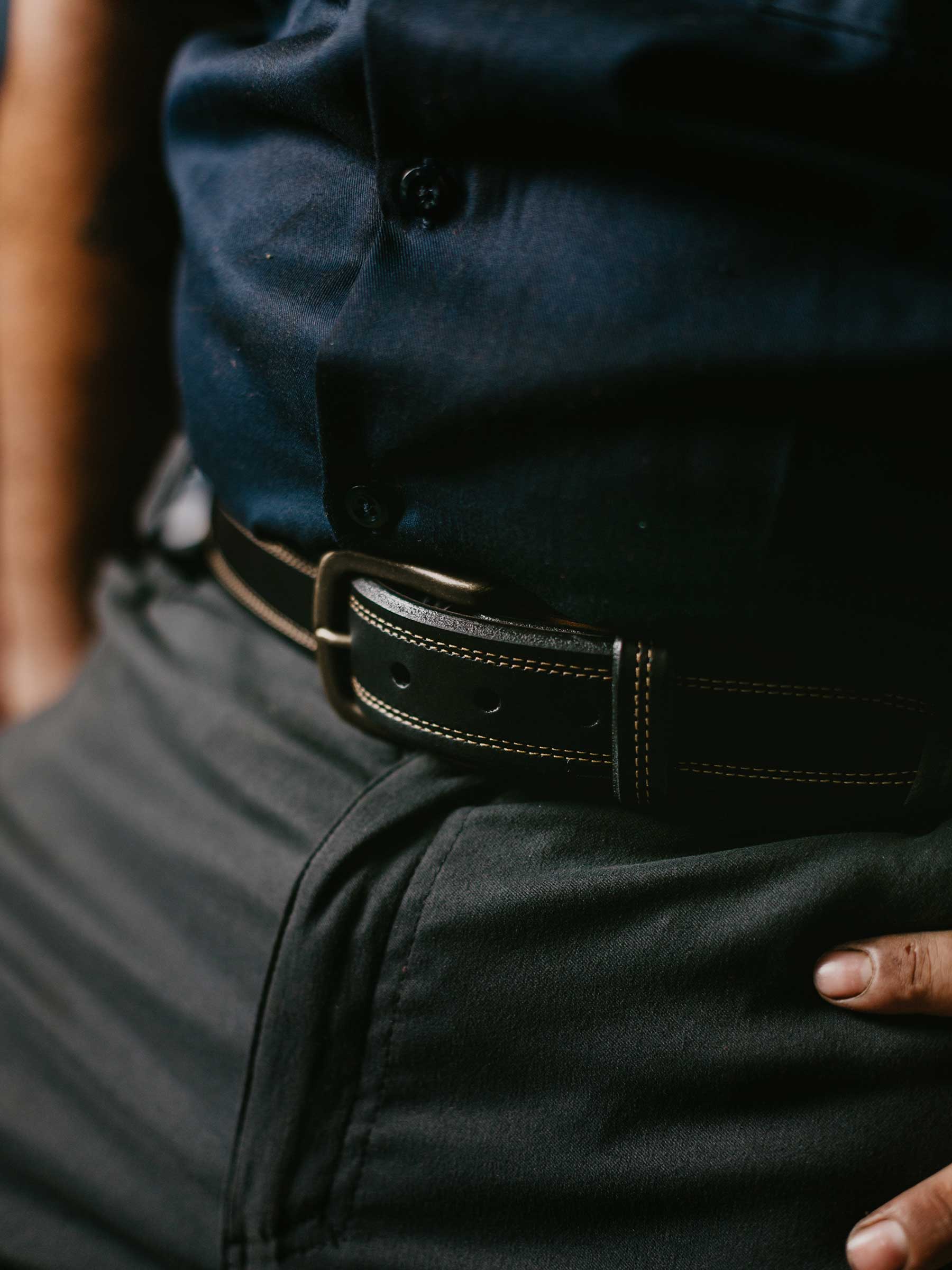 Black men's leather belt from Lejon Belts Crusader series, 1.5-inch width, with adjustable buckle and smooth finish.